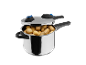 Metal pressure cooker filled with potatoes