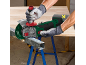 Man cutting metal with a cordless angle grinder.
