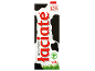 UHT milk carton with 3.2% fat content, 1.5L, featuring cow print and grass.