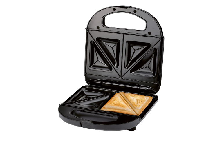 Open black sandwich maker with a toasted sandwich inside