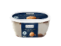 Coffee flavoured ice cream tub with a scoop of ice cream and coffee beans on the label.