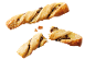 Chocolate puff pastry twists, one broken in half.