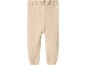 Knitted baby trousers in a light beige color with ribbed waist and cuffs.