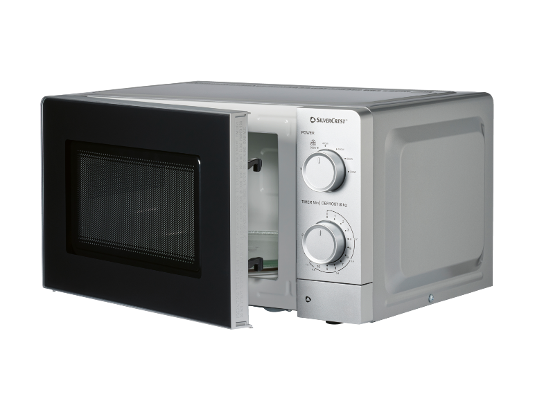 Silver microwave oven with open door and control dials for power and timer.