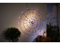 Light-up Halloween wall spiderweb with a lantern and pumpkins.