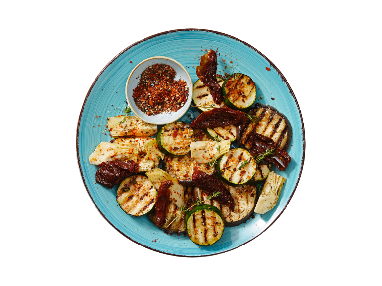 Grilled vegetables with zucchini, eggplant, artichokes, and sun-dried tomatoes, with spices.