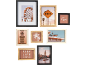 An assortment of photo frames with images of a Ferris wheel, an 'END' sign, palm trees, and Big Ben.