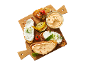 Wooden board with toast with cream cheese, pepper spread, tomatoes, and grilled vegetables.