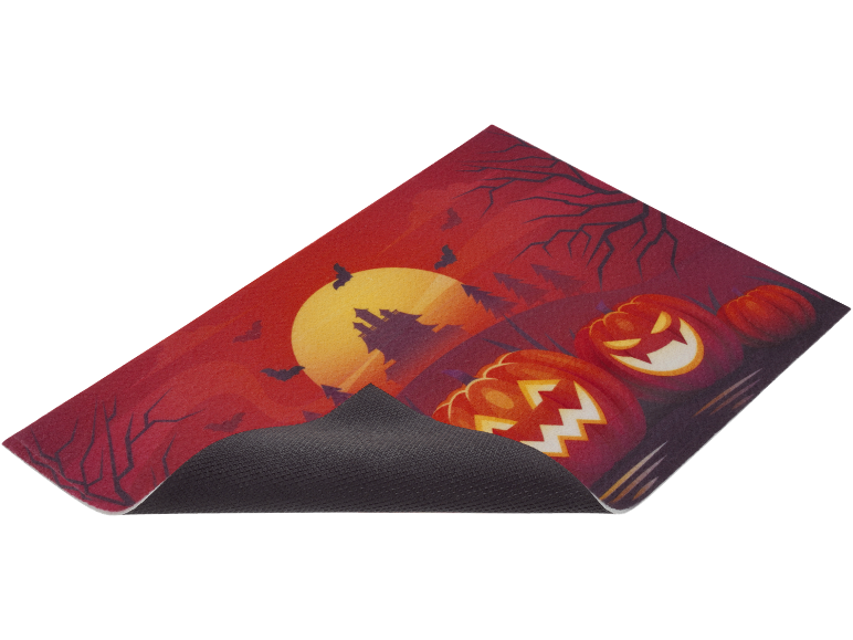 Halloween mat with pumpkins, full moon, castle, and bats.