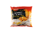 Breaded squid rings in a package, with lemon and sauce.