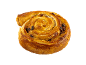 A golden, rolled raisin swirl on a black background.