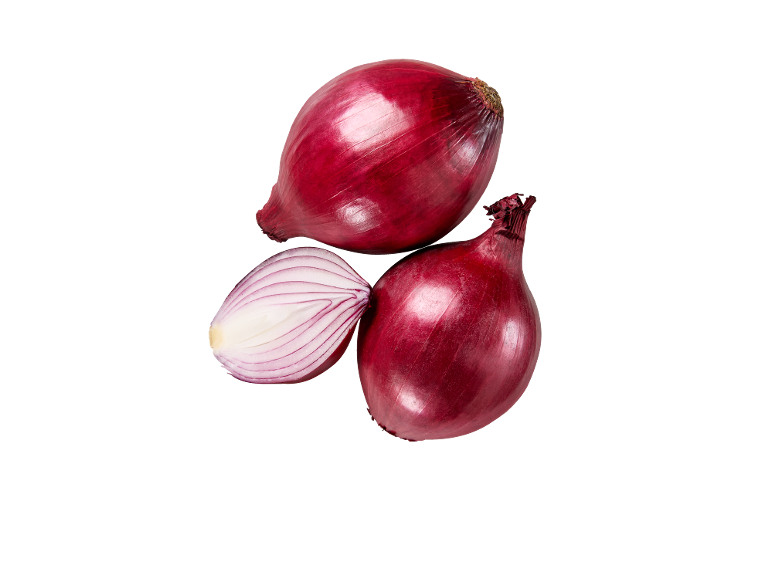 Fresh red onions, one of them cut in half, on a black background.