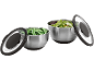 Two stainless steel bowls with lids, one with peas and the other with lettuce.