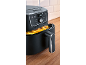 Air fryer with french fries, digital display showing 170 °C.