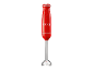 Red immersion blender with silver accents and the inscription '1973'.