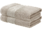Two folded beige towels with a decorative pattern.
