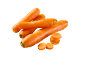 Fresh whole and sliced carrots on a black background.