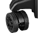 Close-up of a black wheel with tread and rim, attached to a base.