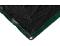 Detail of a black protective tarp with green edges and a metal eyelet.