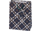 Gift bag with navy, white, brown, and green plaid pattern with green handles.