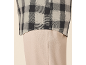 Plaid shirt and beige trousers.