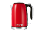 Red electric kettle with chrome accents and the inscription '1973'.