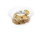 Halkidiki olives from Greece with thyme and pit in a transparent plastic container.