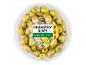 Chalkidikis olives marinated with herbs in a plastic container, with Nutri-Score B and vegan label.