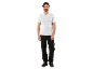 Man in white V-neck t-shirt and black work trousers
