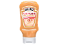 Orange bottle of mayonnaise-ketchup sauce, with 'Saucy Sauce' text on the label.