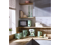 Light green kitchen appliances in a kitchen corner with wooden shelves and counter.