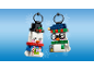 Two toy snowman keychains on a snowflake blue background.