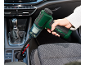 Handheld car vacuum cleaner cleaning the cup holder.