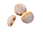 Doughnuts with powdered sugar, one sliced with cherry filling.