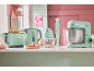Mint kitchen appliances: toaster, kettle, chopper, immersion blender, and stand mixer on a countertop.