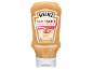 Orange bottle of mayonnaise-ketchup sauce, labeled 'Saucy Sauce'.