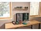 Workbench with screwdrivers, storage boxes, and work gloves for DIY.