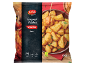 Frozen seasoned potatoes (Patatas Bravas) in packaging with a Spanish dancer and cooking instructions.
