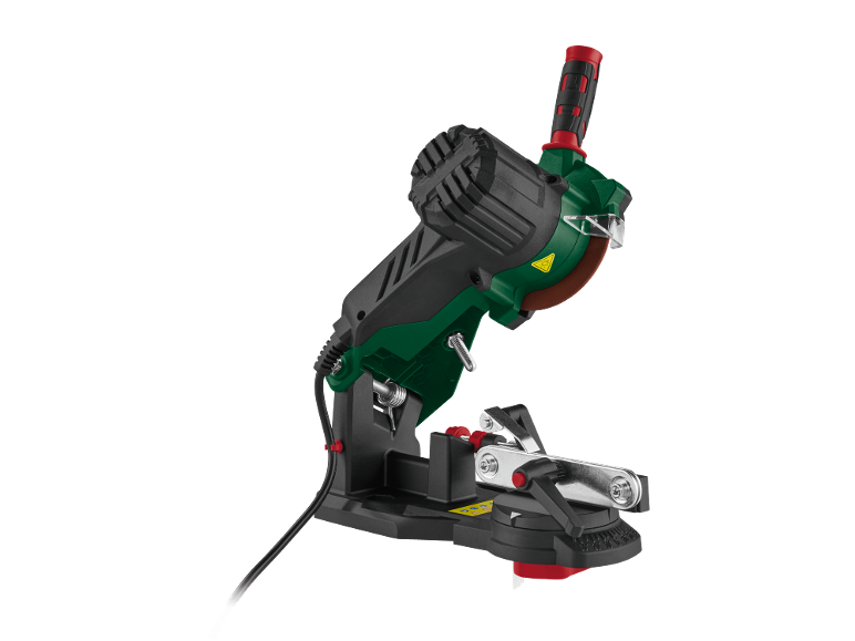 Electric chainsaw sharpener on a black background.