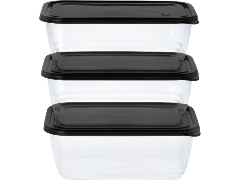 Three clear food storage containers with black lids, stacked on top of each other.