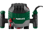 Green and black electric router with red details and brand logo.