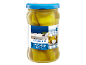 Hot green chillies filled with soft cheese in a glass jar, with a Greek landscape theme.
