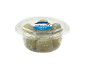 Green pitted olives with cheese and lemon in a transparent container, 150g.