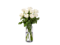 Bouquet of white roses in a glass vase with water.
