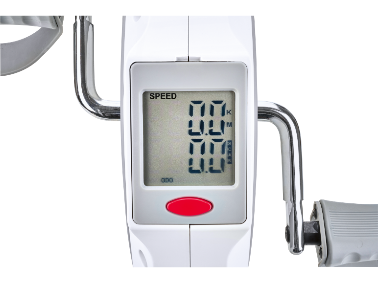 Close-up of a white mini exercise bike with a digital display showing 'SPEED' and '0.0'
