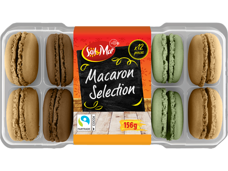 Macaron Selection: 12 pieces of chocolate, green, and light macarons in clear packaging.