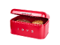 Red bread bin with two loaves of bread and the inscription «1973».