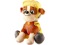 Plush toy of a brown and yellow dog character wearing an orange and yellow uniform.