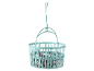 Blue plastic hanging basket with clothes pegs.
