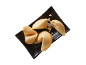 Fortune cookies on a black plate, one broken with a visible fortune slip.